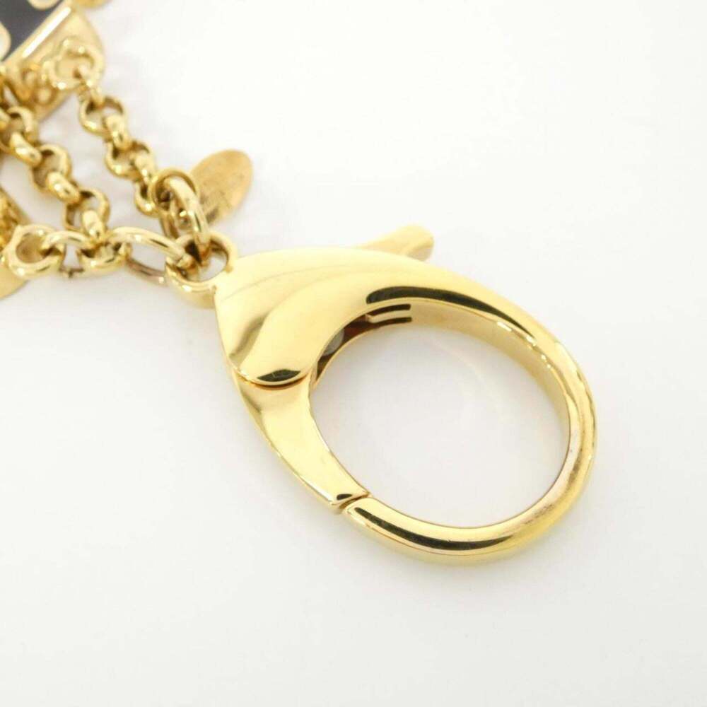 LOUIS VUITTON Silver Monogram Bag Charm - Picture 4 of 4